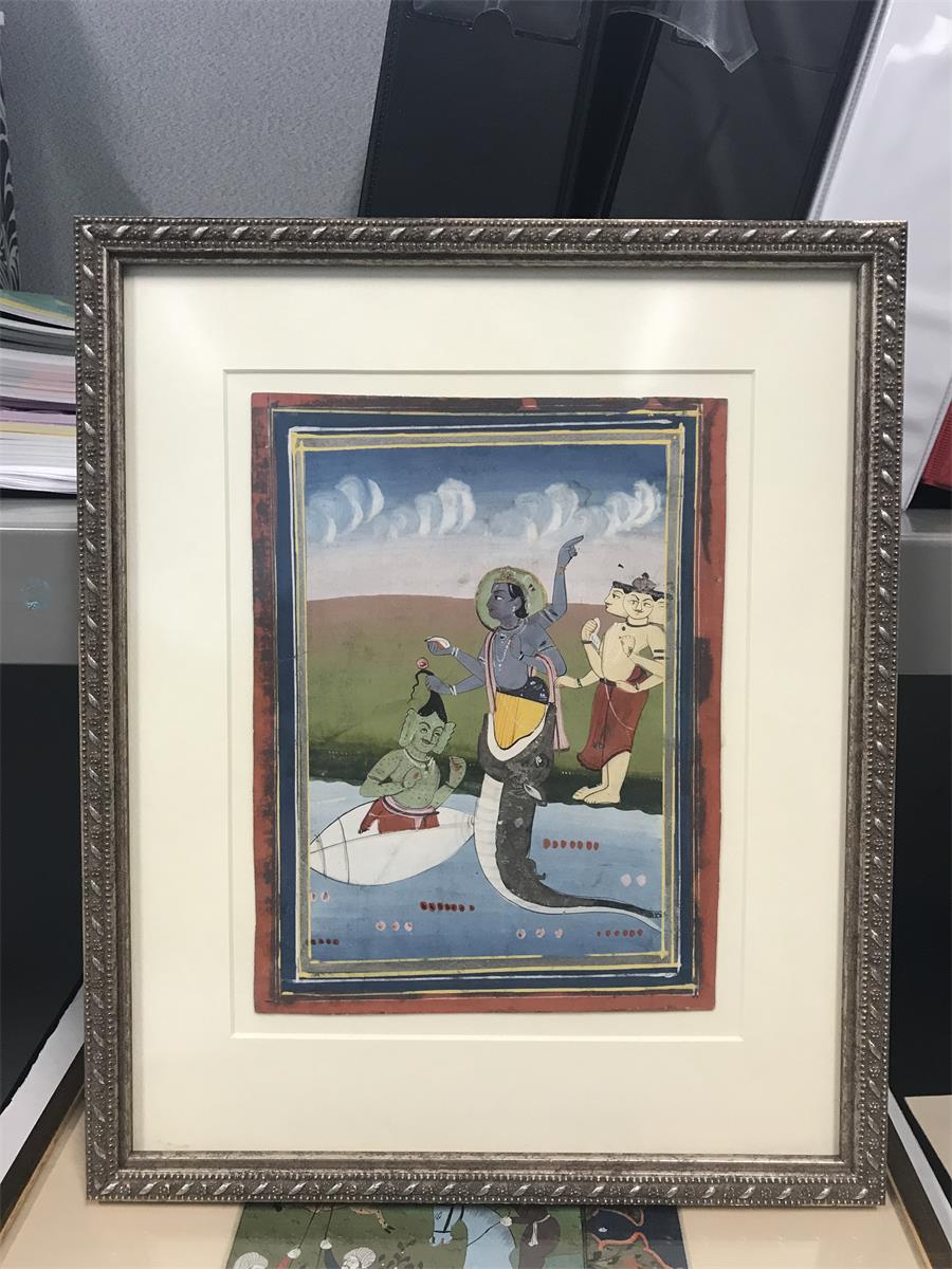 3 deities near body of water